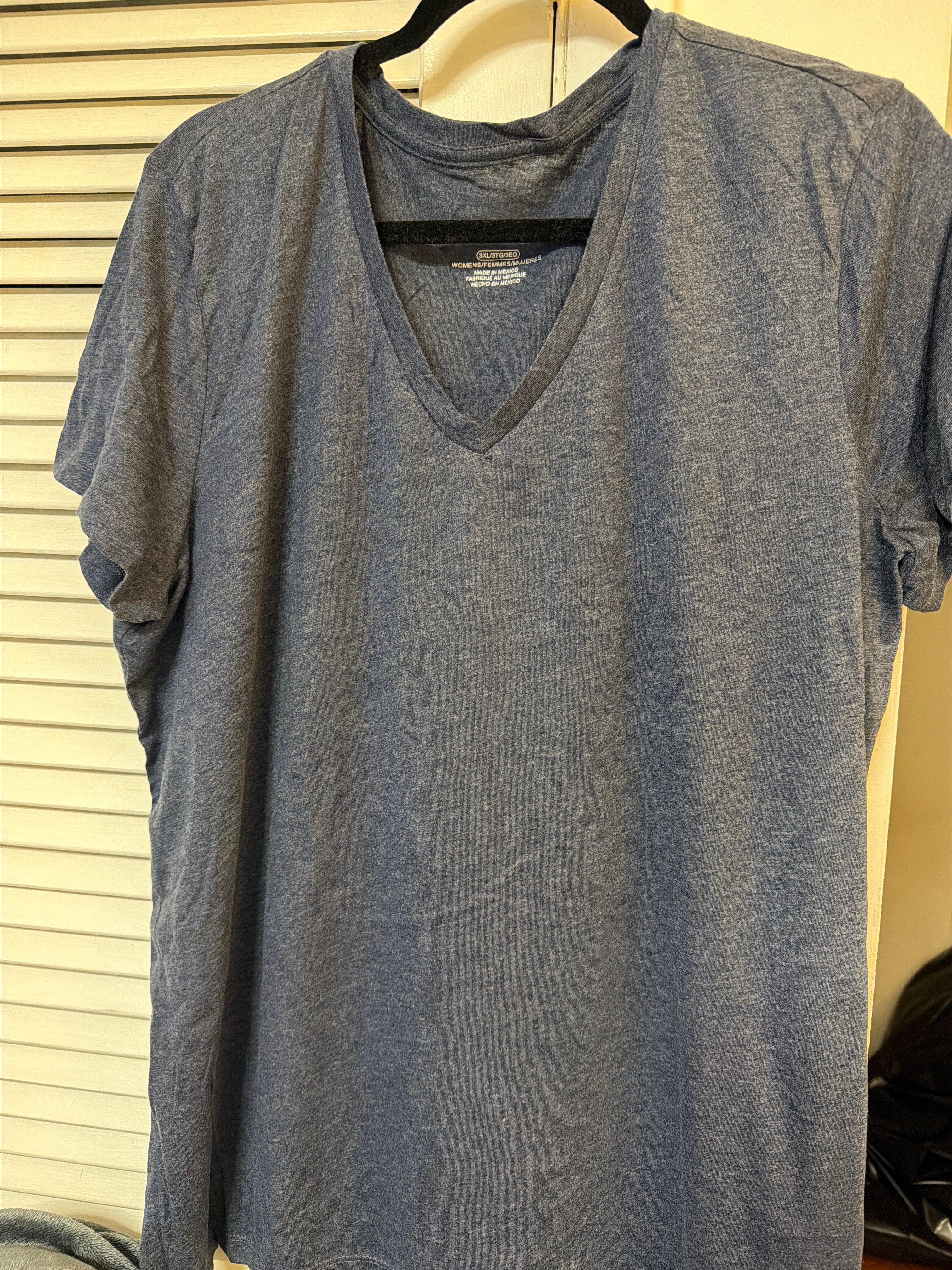 Three extra large, three tall T-shirts
